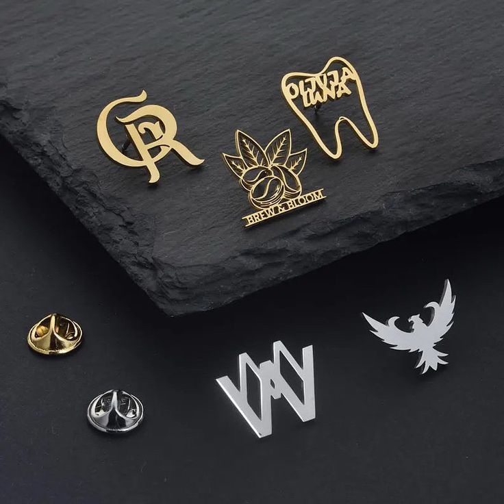 Client reference custom gold and silver lapel pins